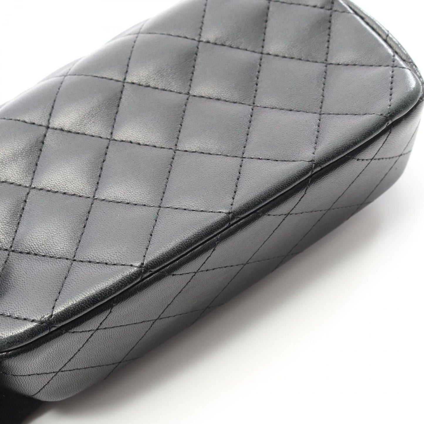 CHANEL Mini Matelassé Shoulder Bag in Black Lambskin