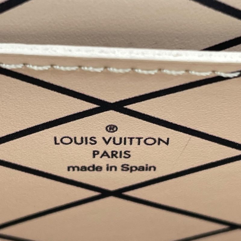 Louis Vuitton Monogram Reverse Vertical Pochette M67873 - Unisex