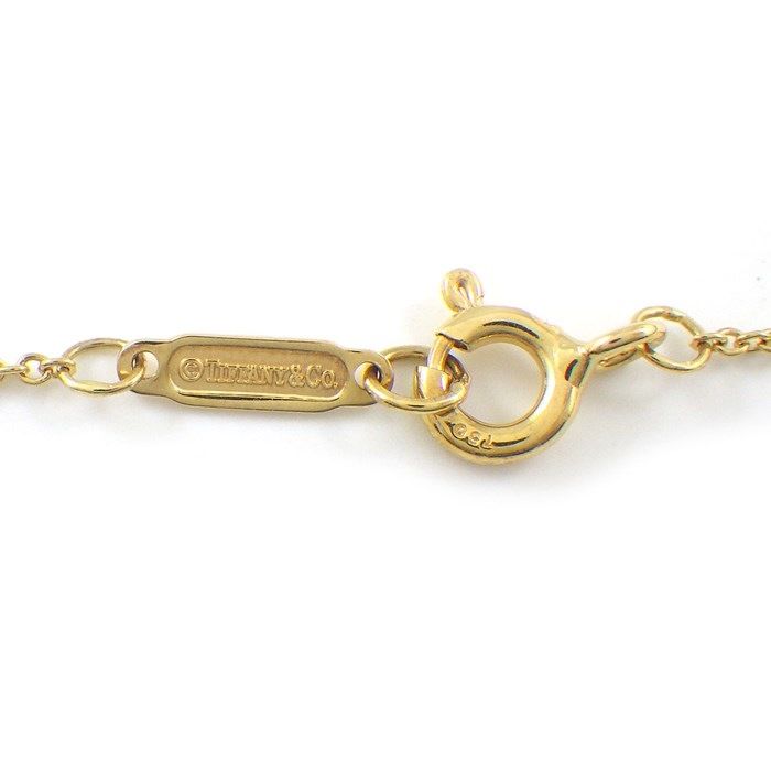 Tiffany & Co. Cross Necklace with Diamond in 18K Yellow Gold