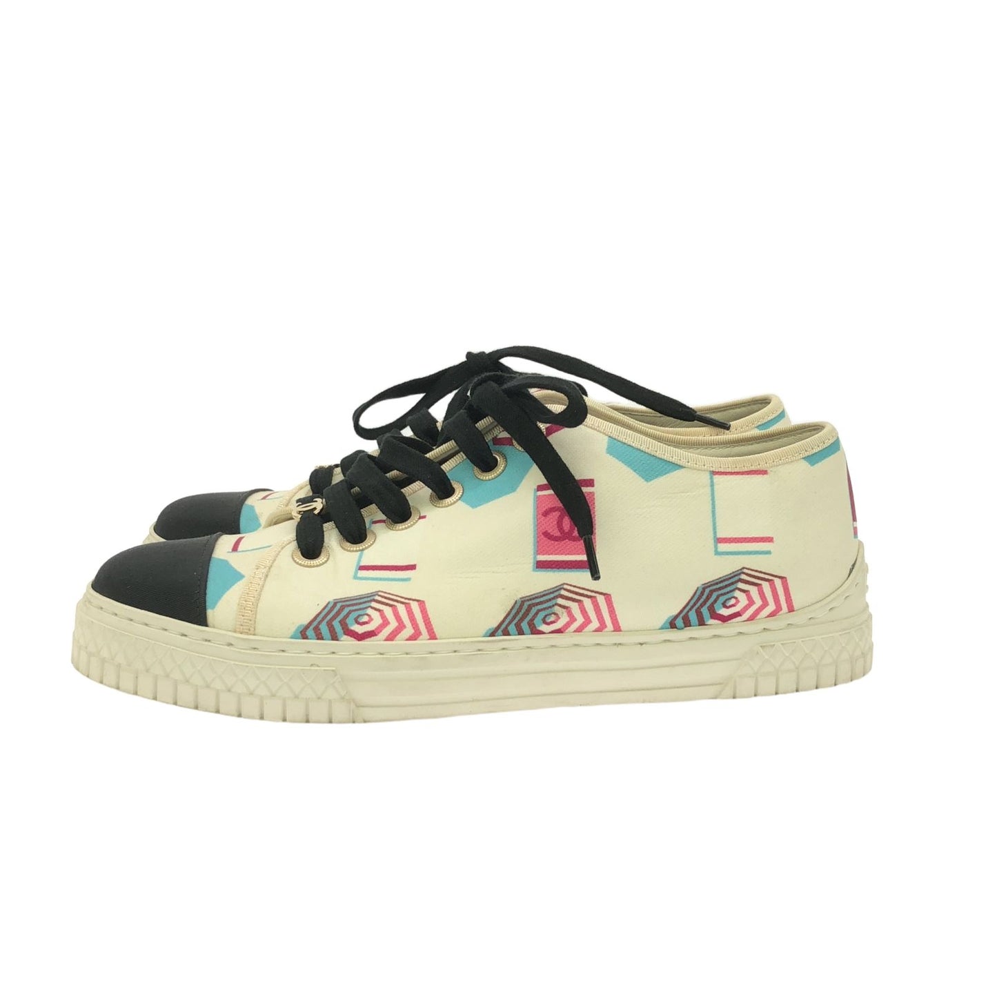CHANEL White Sneakers - Timeless Elegance and Craftsmanship
