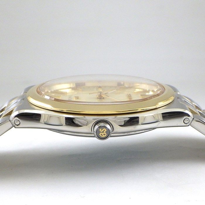 Grand Seiko SBGG002: Exquisite Gold Dial Quartz Watch