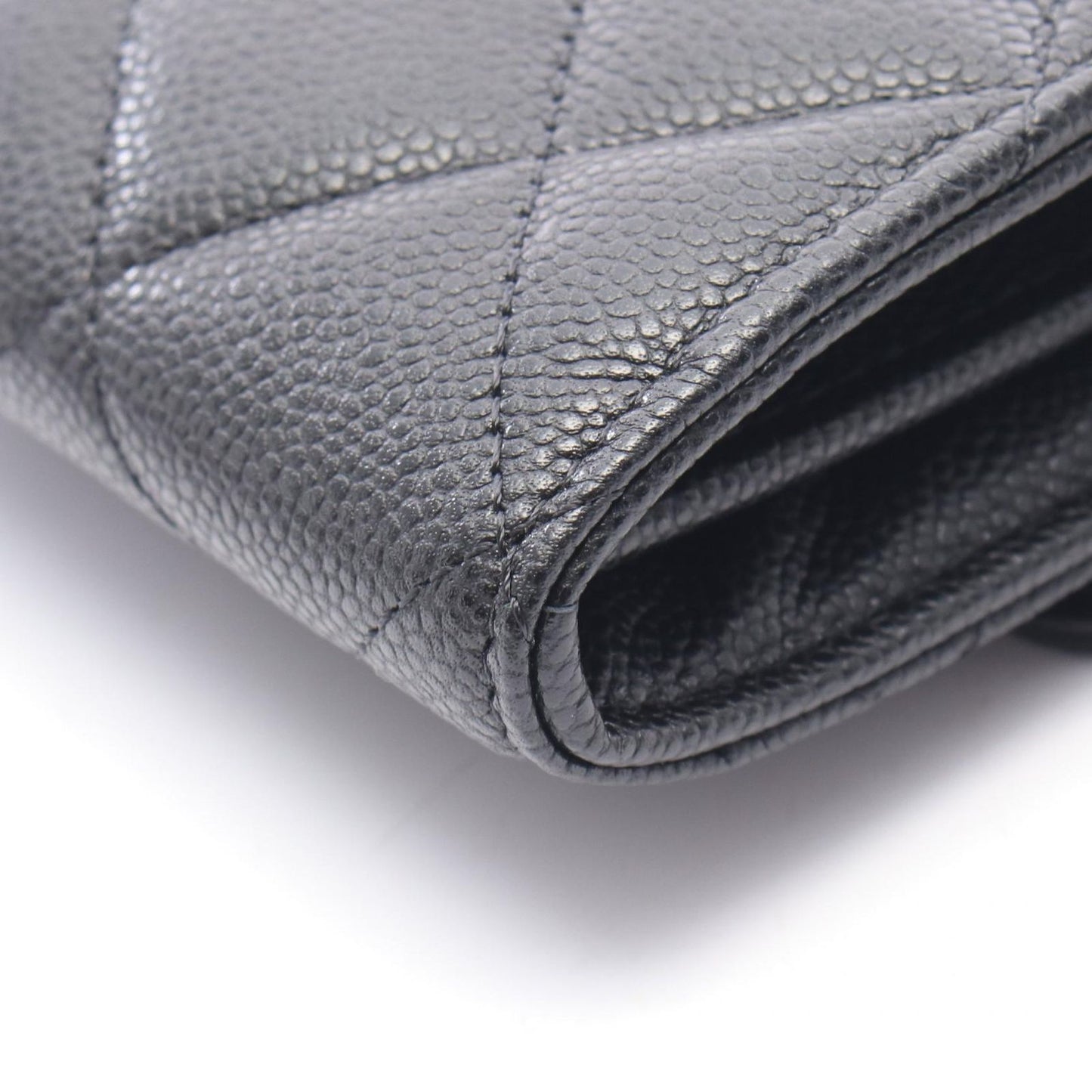 CHANEL Matelassé Mini Chain Wallet in Black Caviar Leather