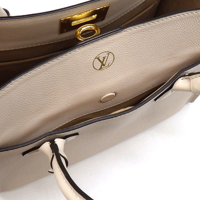Louis Vuitton OnMySide MM Handbag in Greige Mahina Leather
