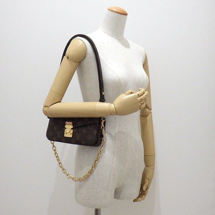 Louis Vuitton Monogram Pochette Métis EW Handbag - Timeless Elegance