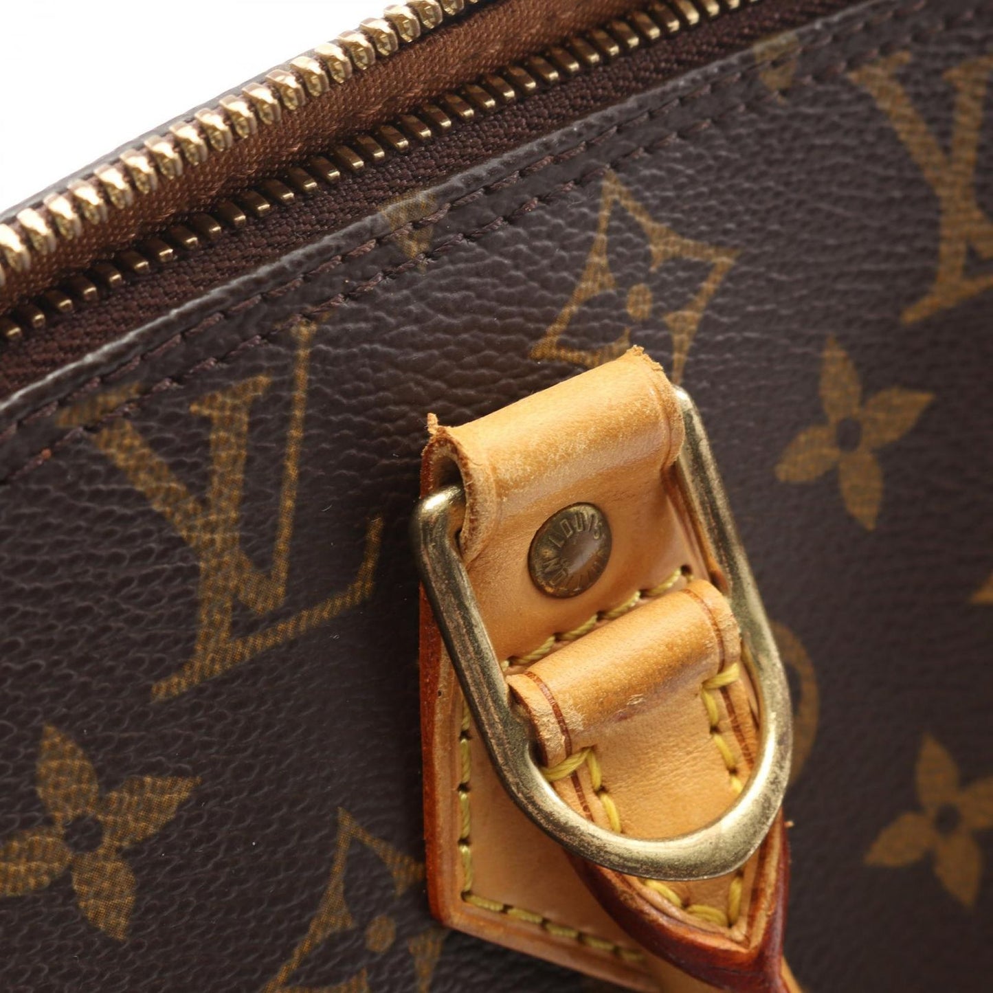 Louis Vuitton Alma PM Handbag - Timeless Elegance in Brown