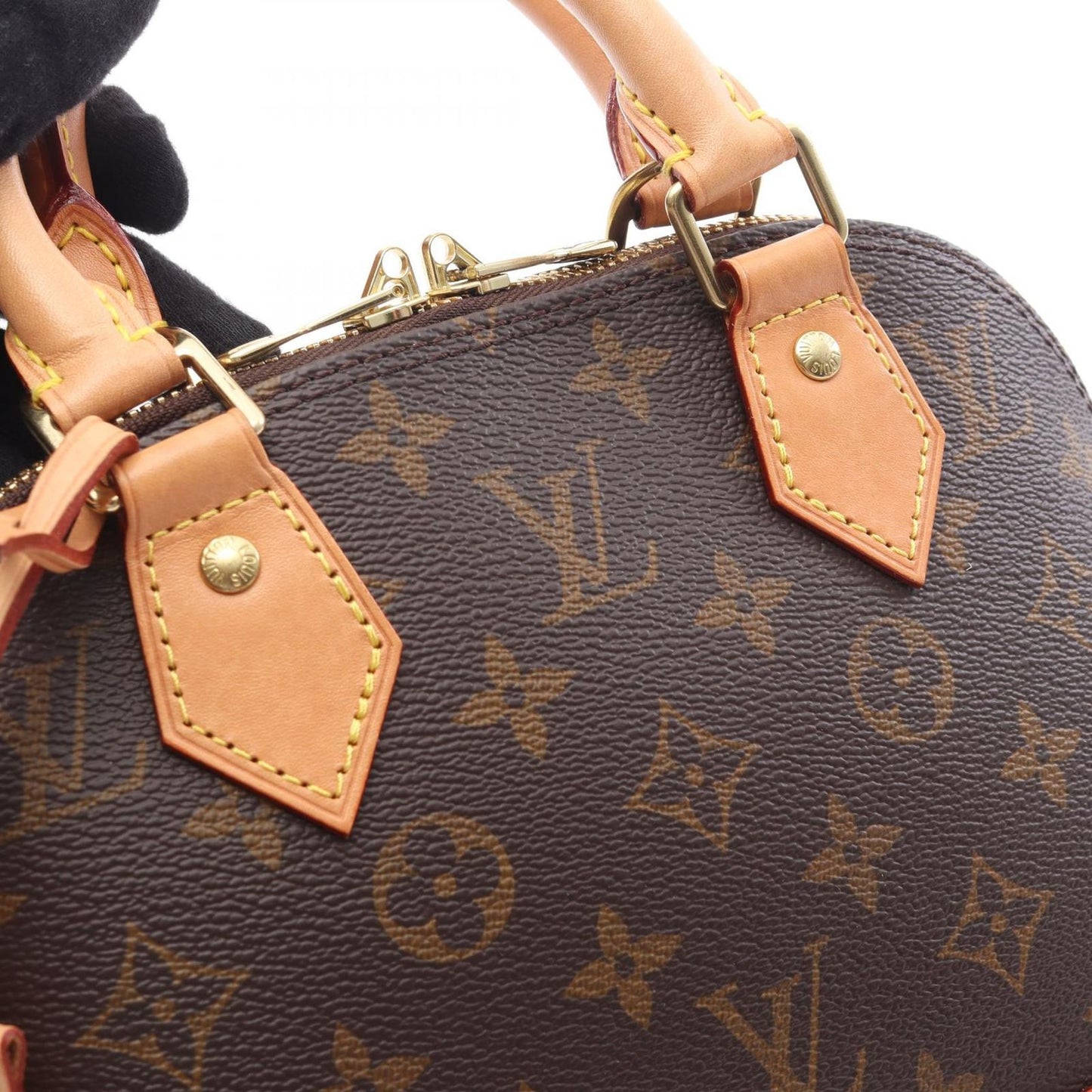 Louis Vuitton Alma BB Handbag - Timeless Elegance in Brown