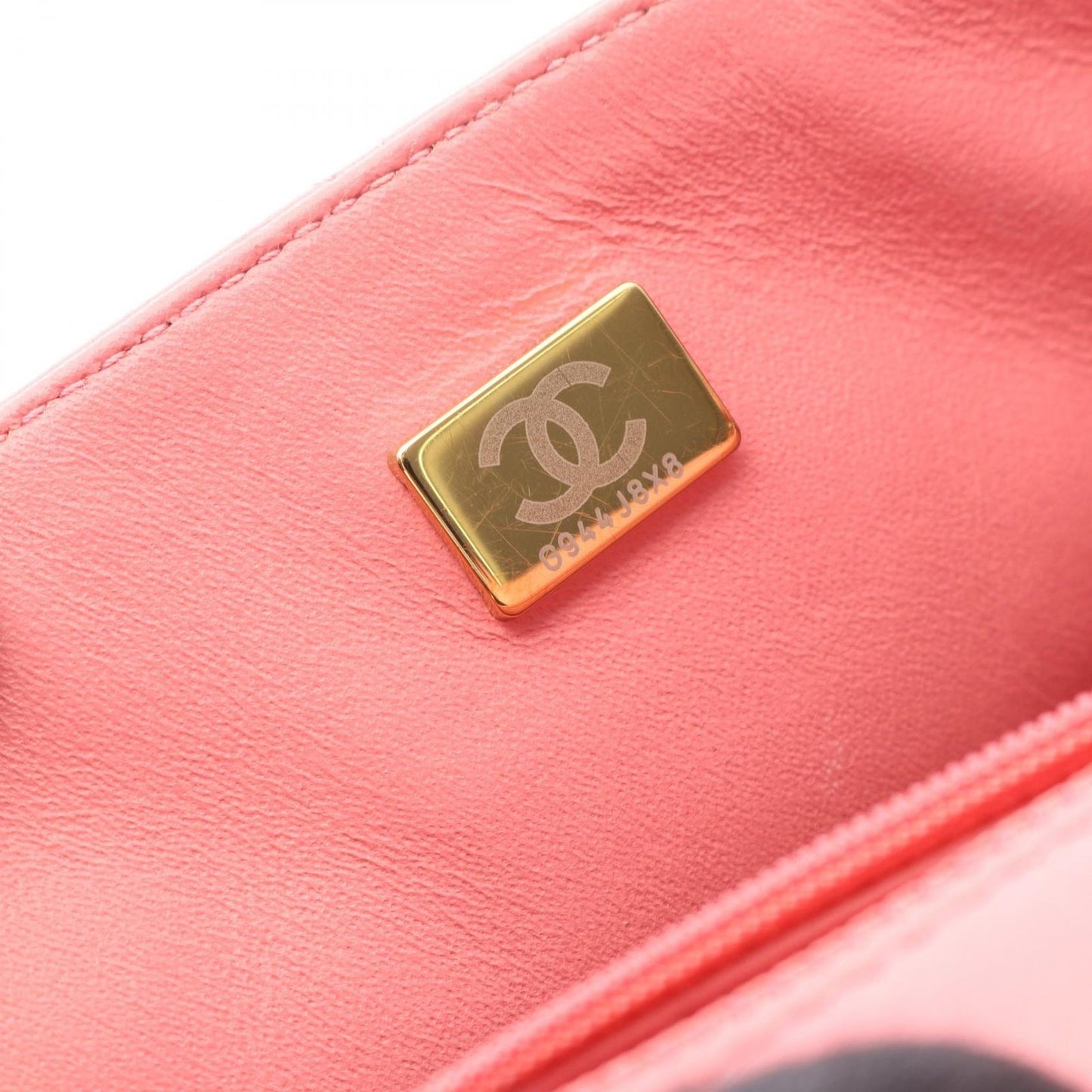 CHANEL Mini Matelassé Shoulder Bag in Pink Lambskin - A35200