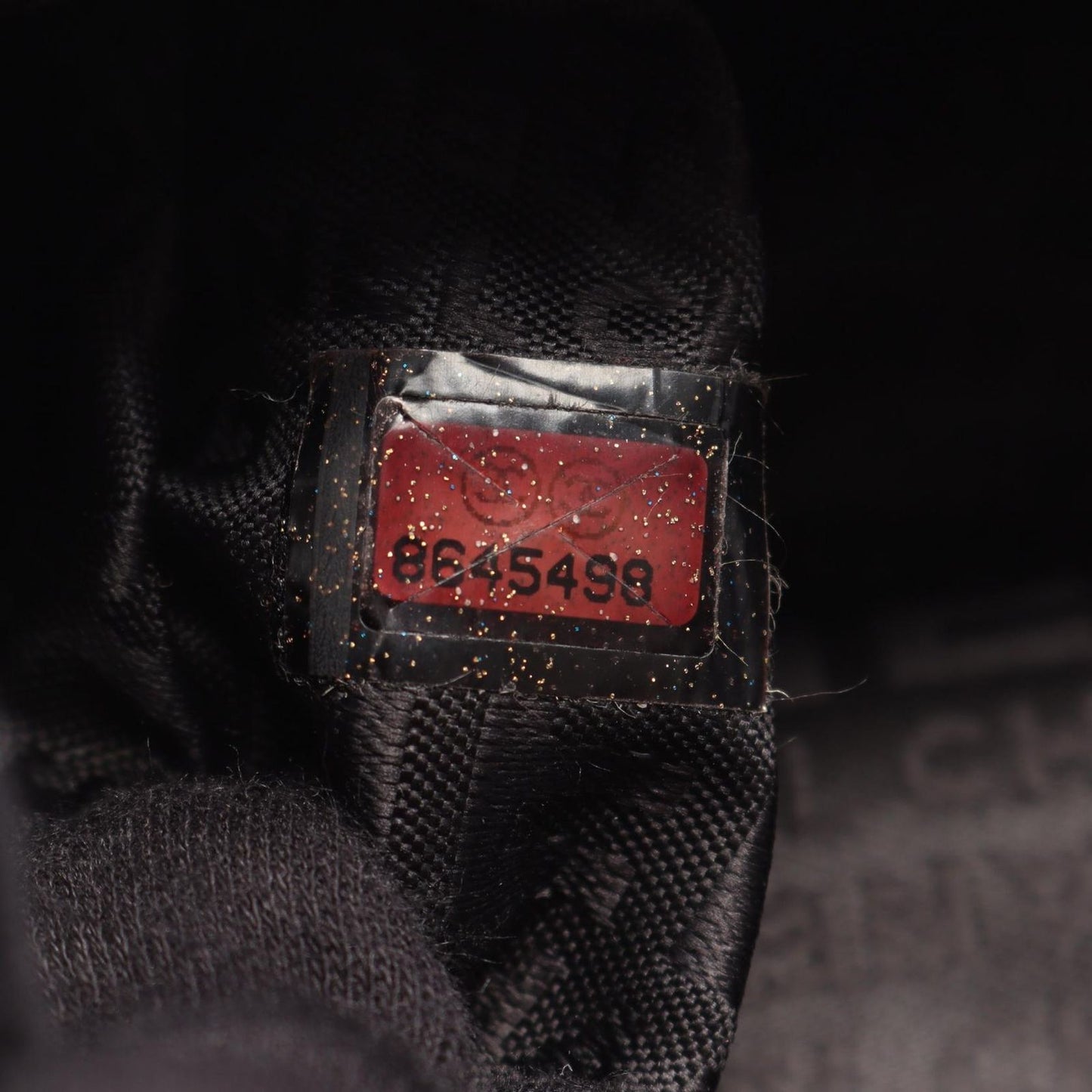 CHANEL Camellia Handbag in Black Lambskin - Timeless Elegance