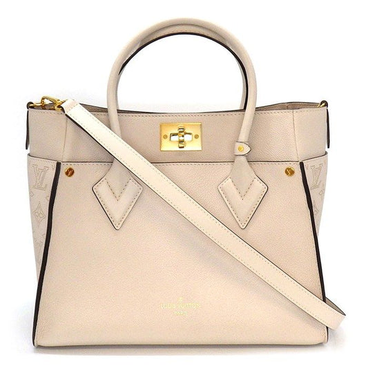 Louis Vuitton OnMySide MM Handbag in Greige Mahina Leather