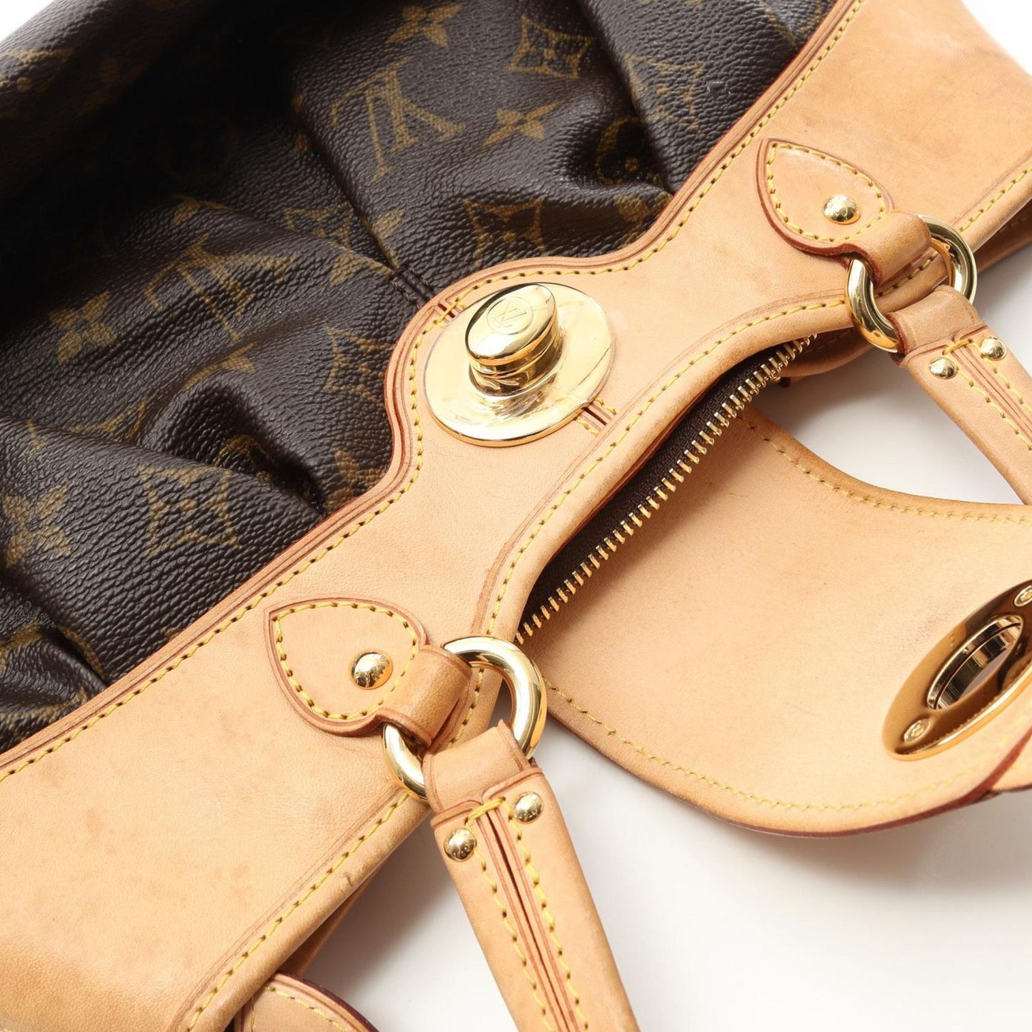 Louis Vuitton Boetie PM Handbag - Timeless Elegance in Brown