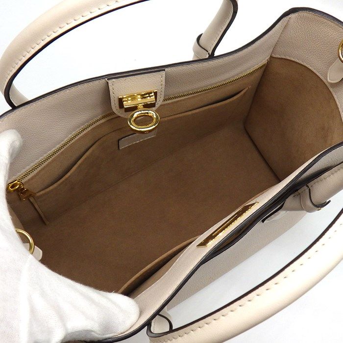 Louis Vuitton OnMySide MM Handbag in Greige Mahina Leather