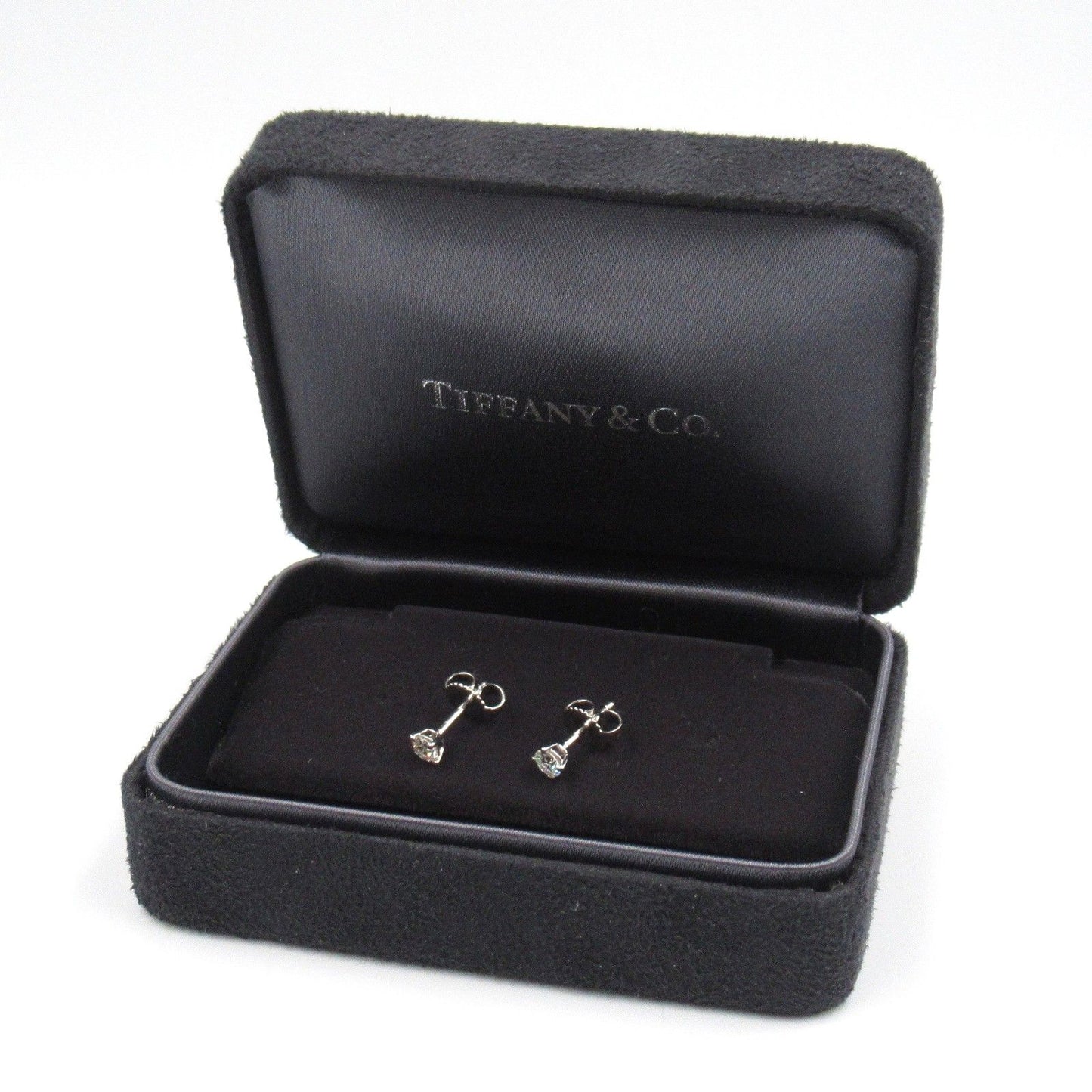 TIFFANY & CO. Solitaire Diamond Earrings in Platinum