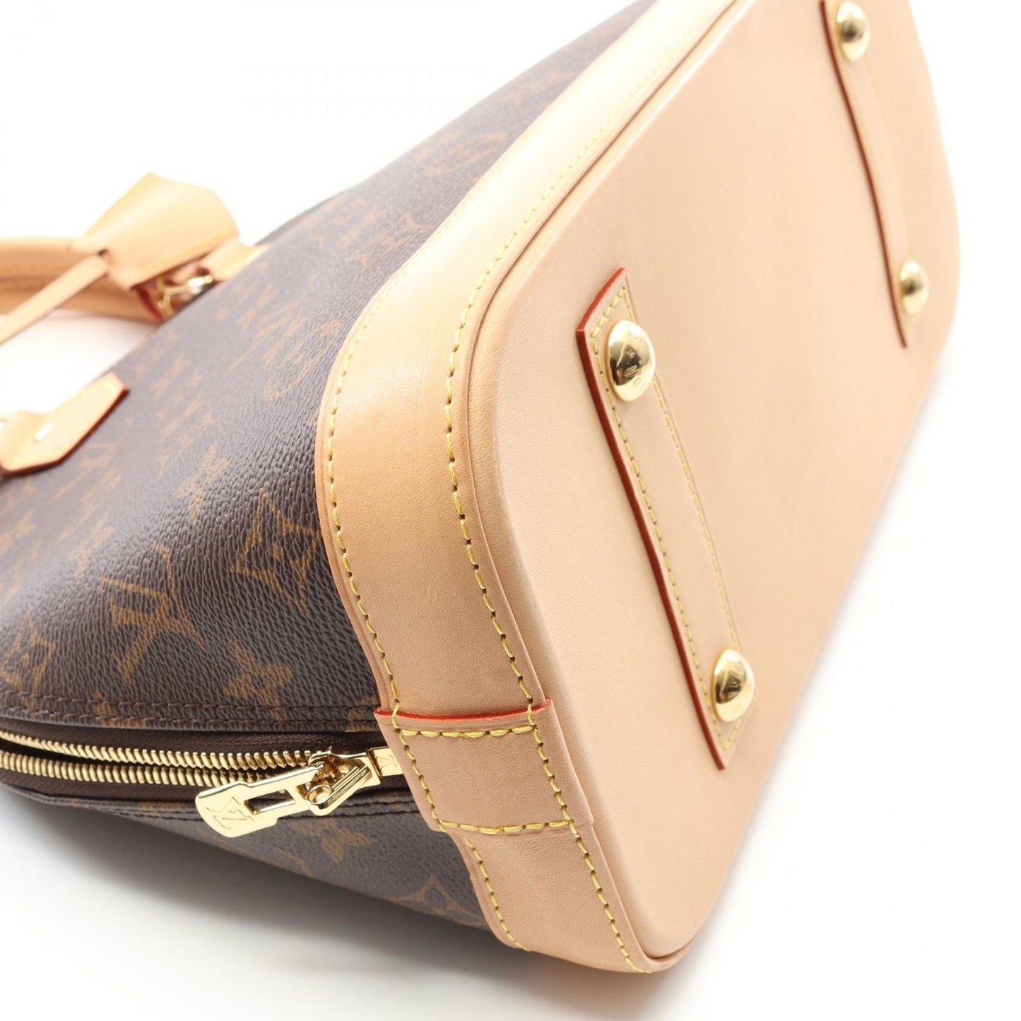 Louis Vuitton Alma Monogram Handbag - Timeless Elegance