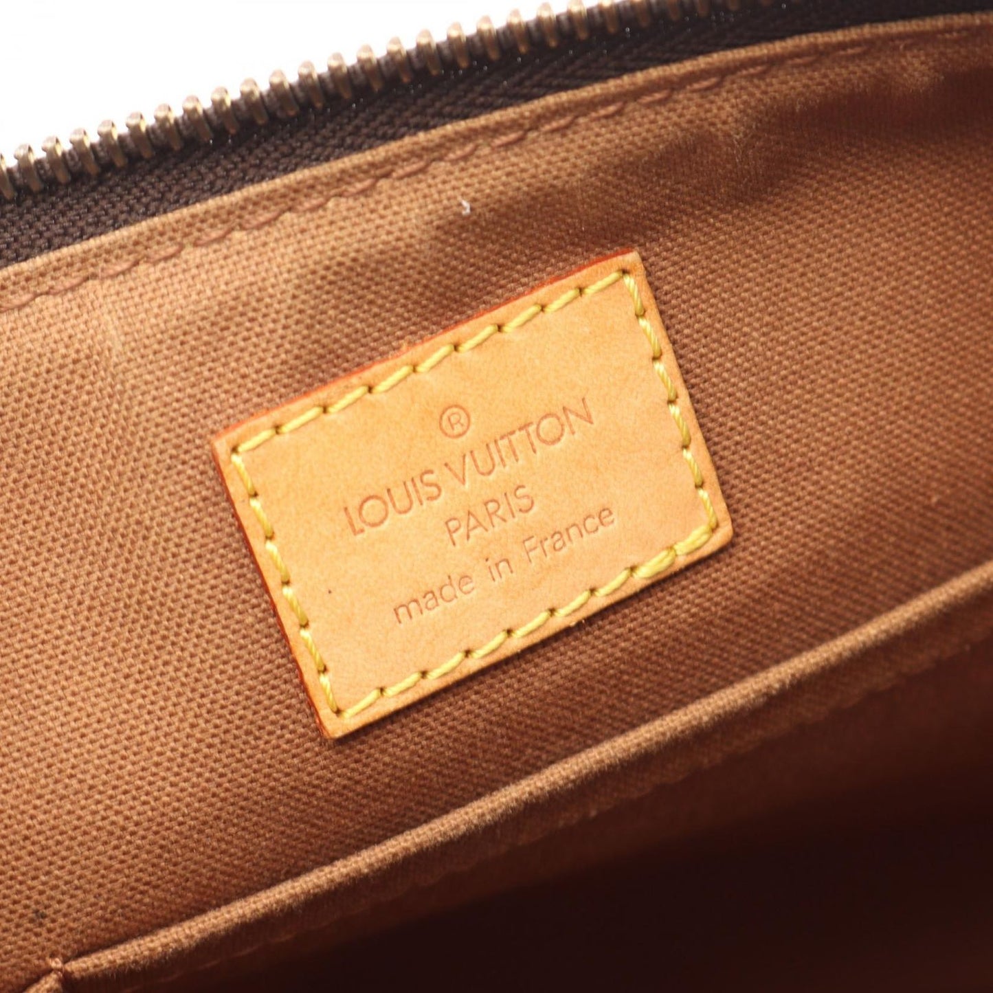 Louis Vuitton Tulum GM Shoulder Bag - Timeless Elegance in Brown