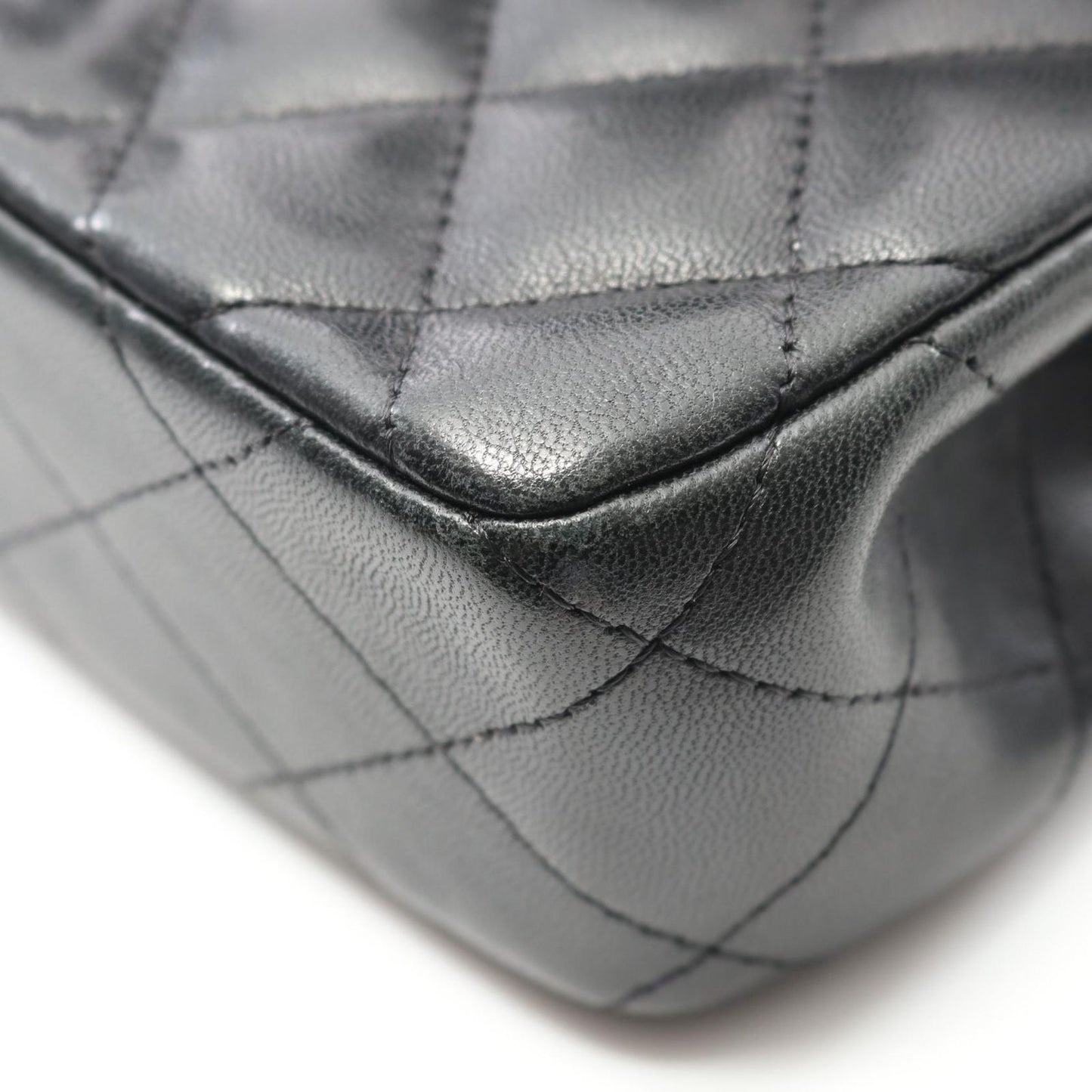 CHANEL Mini Matelassé Shoulder Bag in Black Lambskin