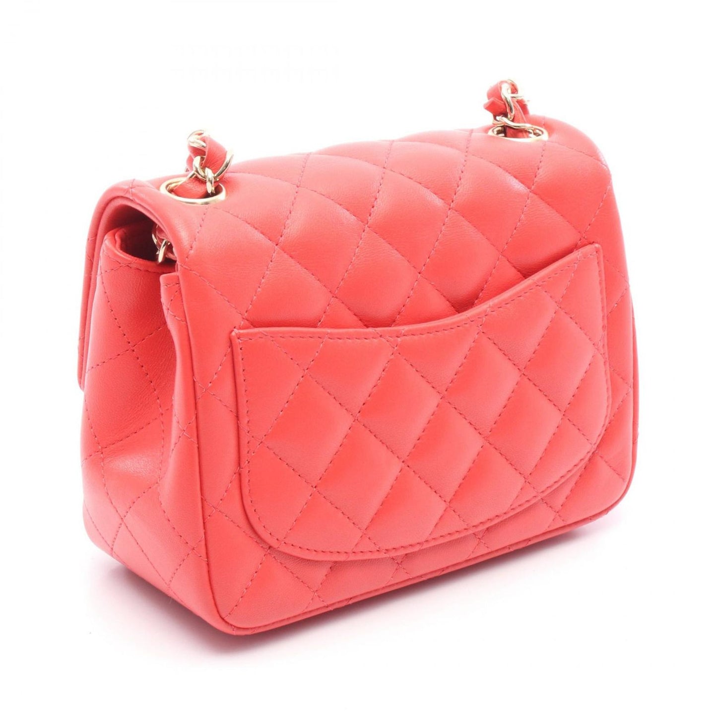 CHANEL Mini Matelassé Shoulder Bag in Coral Pink Leather