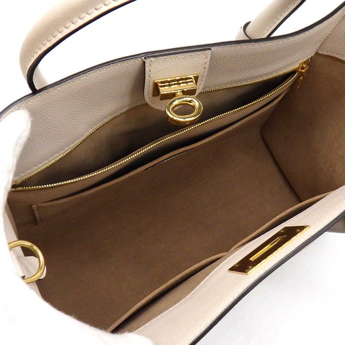 Louis Vuitton OnMySide MM Handbag in Greige Mahina Leather