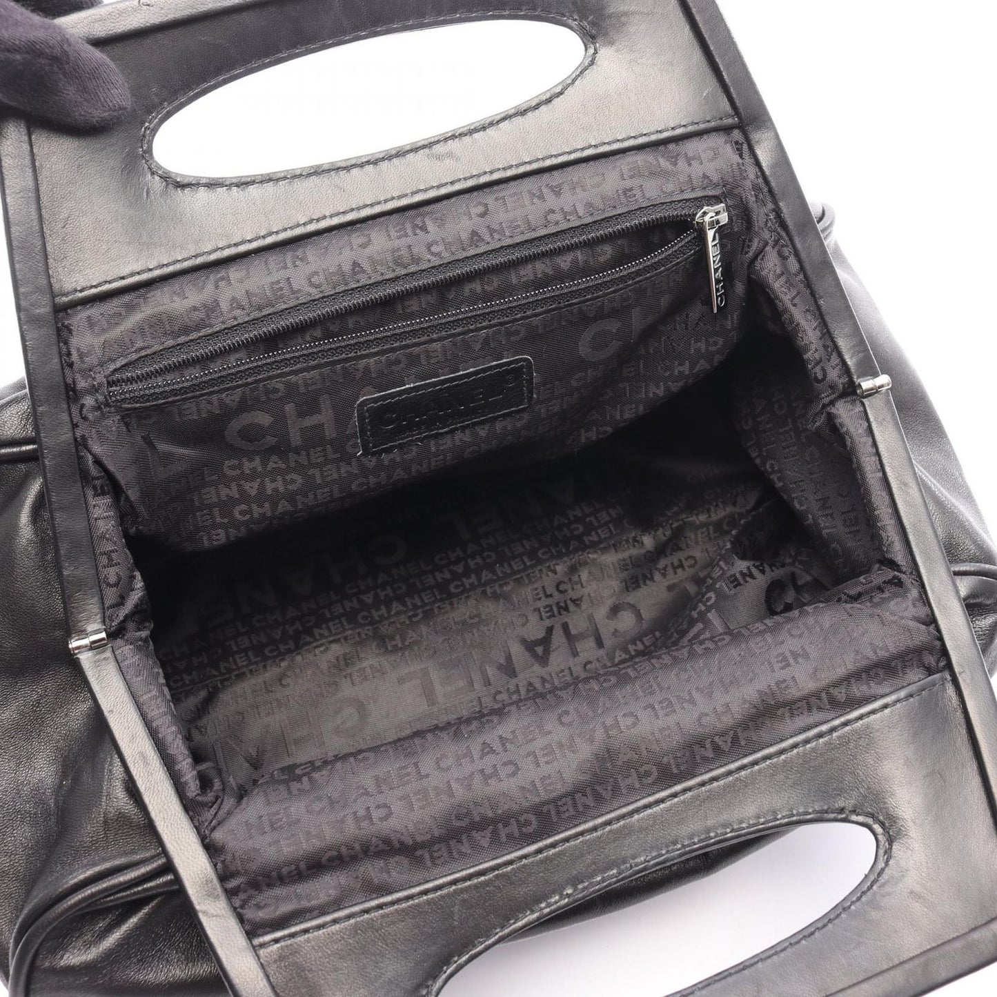 CHANEL Camellia Handbag in Black Lambskin - Timeless Elegance