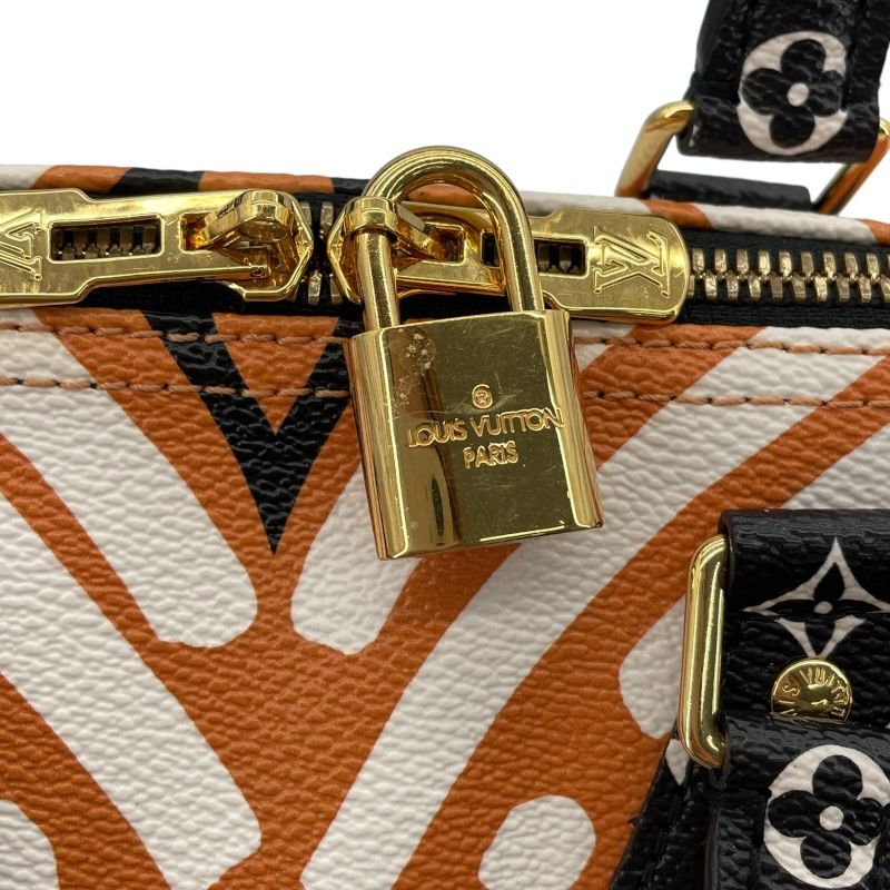 Louis Vuitton Speedy Bandoulière 25 in Crème Caramel - Timeless Elegance