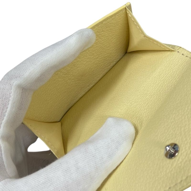 Louis Vuitton Portefeuille Rock Mini Wallet in Banana Trianon Clemence