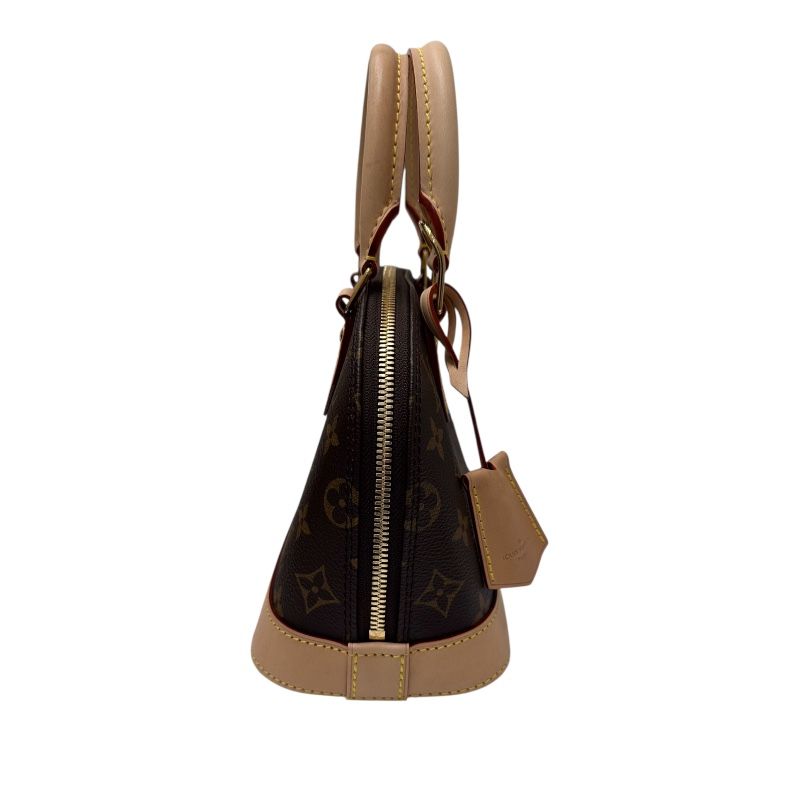 Louis Vuitton Alma BB Monogram PVC Leather Handbag - Timeless Elegance