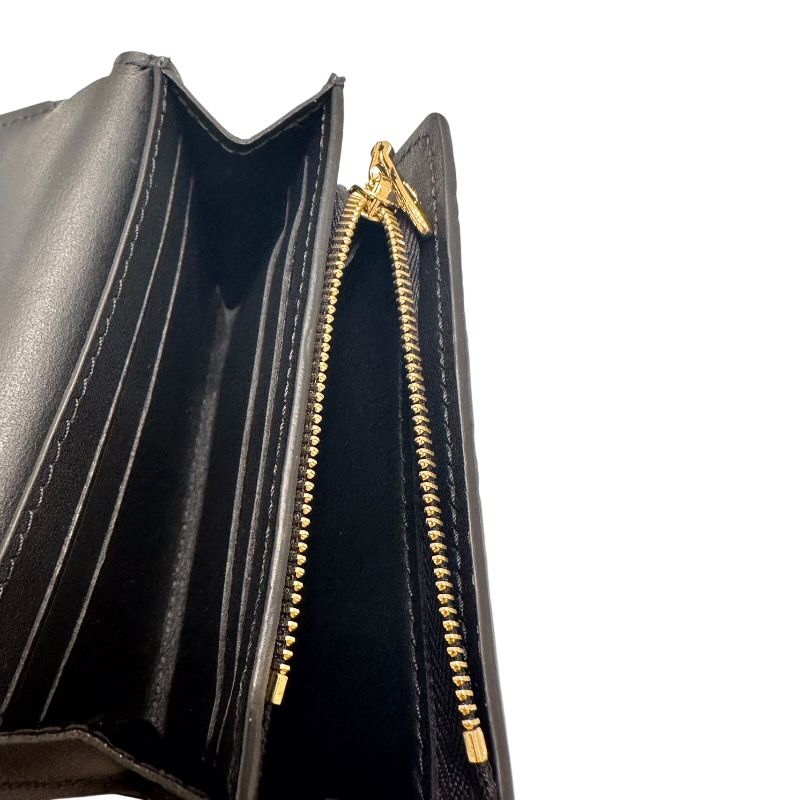 Louis Vuitton Capucines Tiny Wallet in Black Trianon Leather