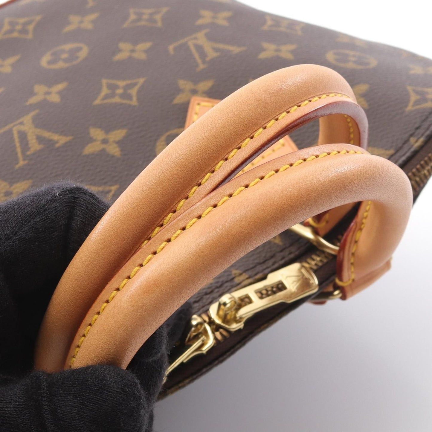 Louis Vuitton Alma PM Handbag - Timeless Elegance in Brown