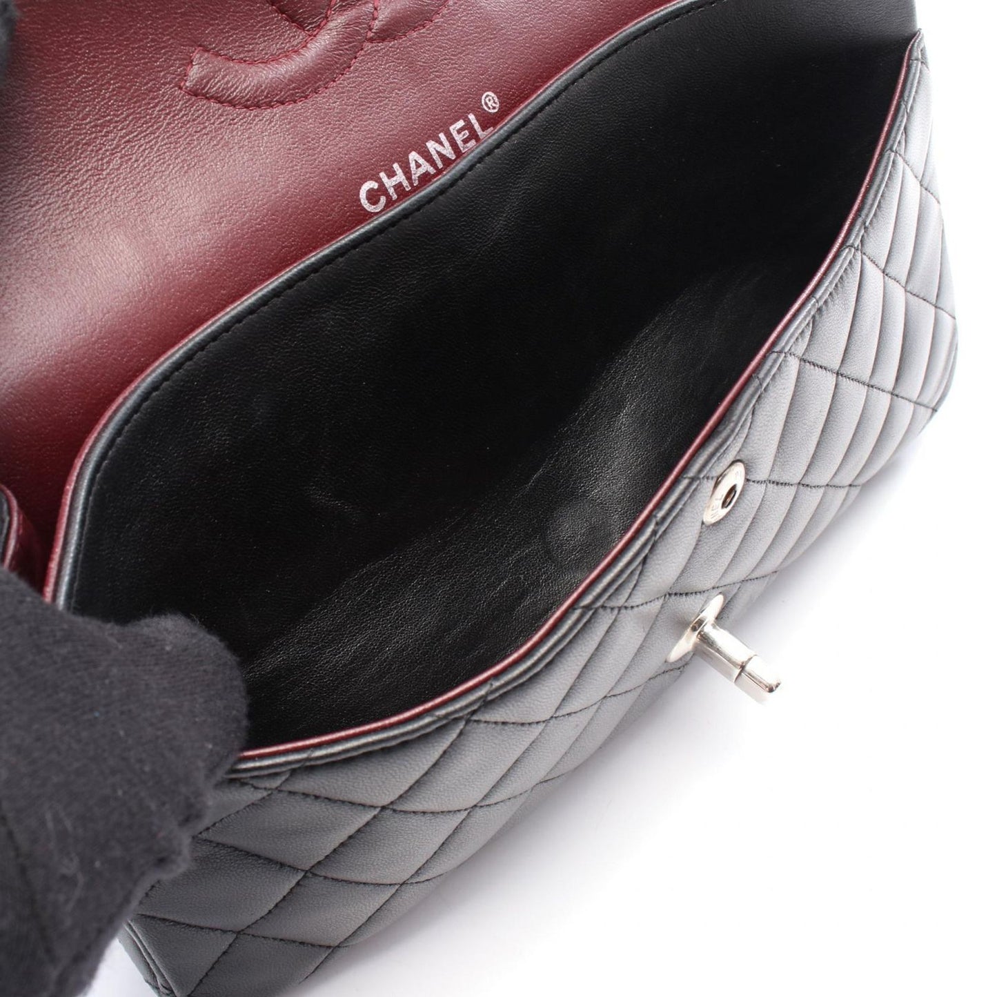 CHANEL Matelassé Double Flap Shoulder Bag in Black Lambskin