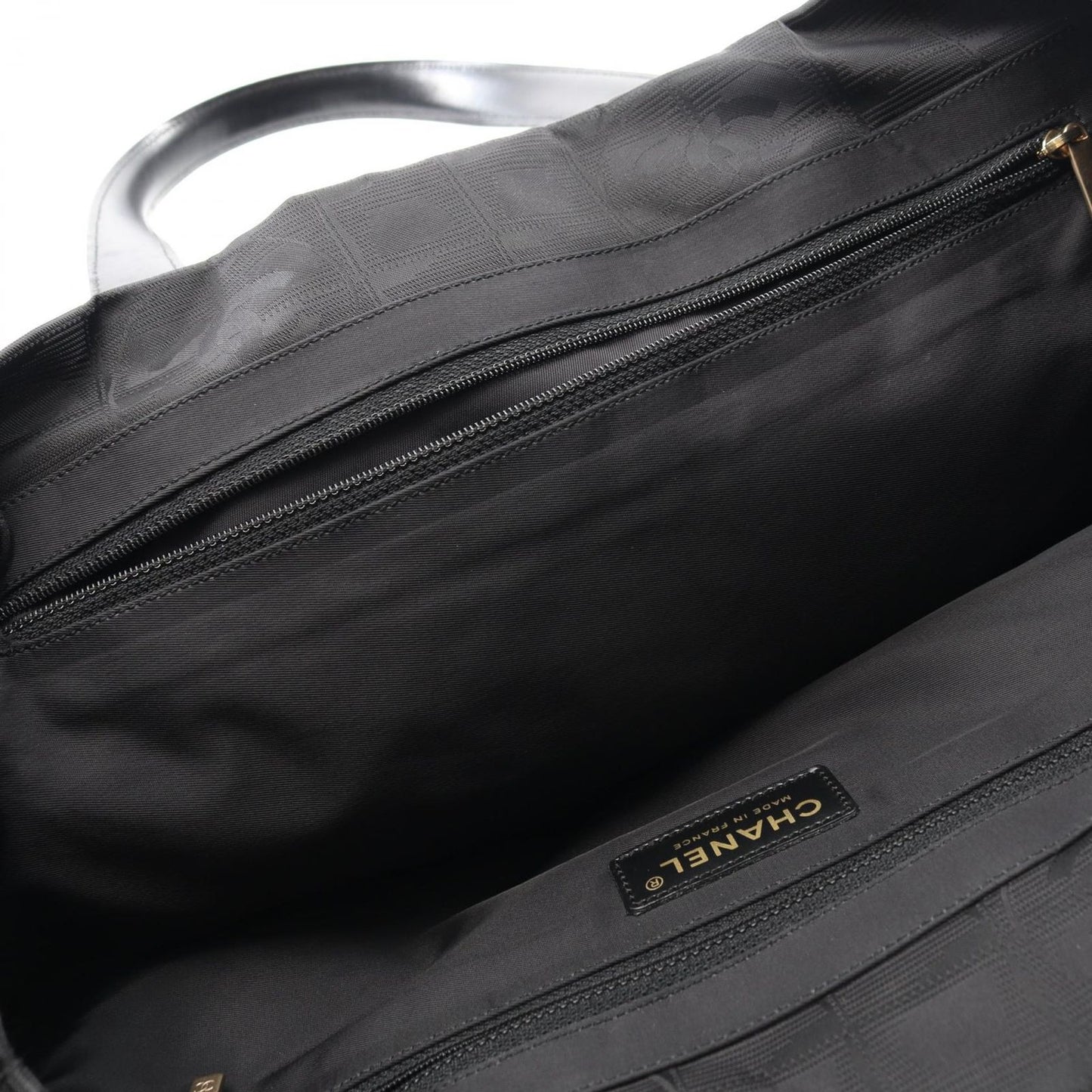 CHANEL Black Leather New Travel Line MM Tote Bag - Timeless Elegance