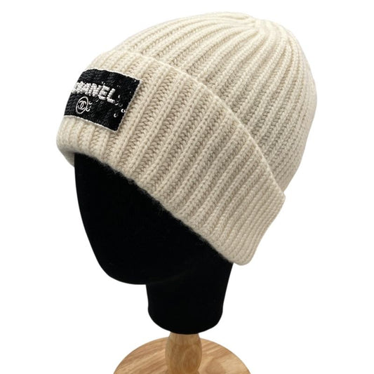 CHANEL Ivory Cashmere Sequin Logo Knit Cap - Unisex Luxury Accessory
