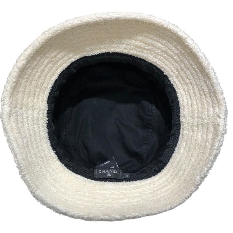 CHANEL Logo Embroidered Pile Bucket Hat in Cream Cotton