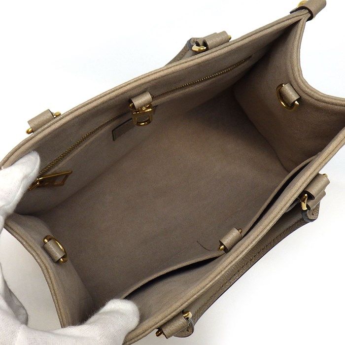 Louis Vuitton OnTheGo PM Handbag in Bi-Color Monogram - Exquisite Craftsmanship