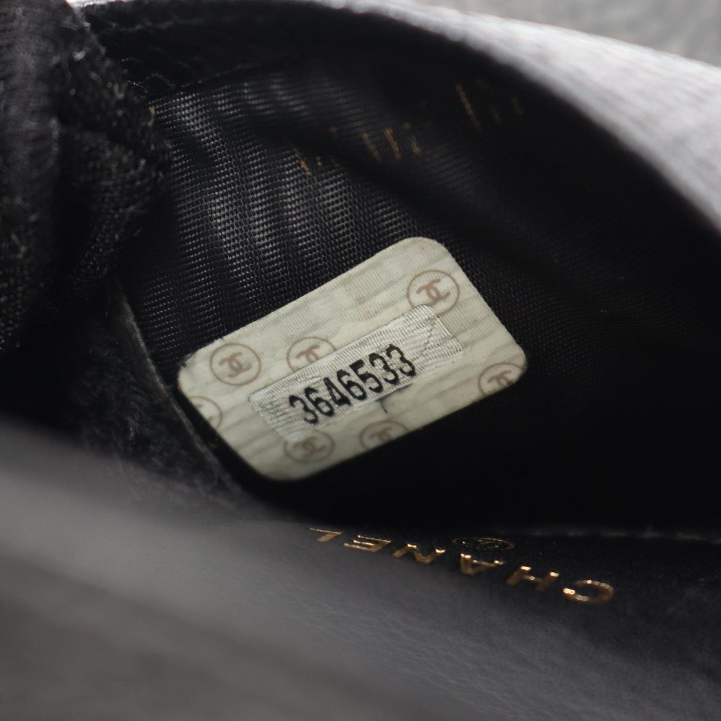 CHANEL Coco Mark Black Calfskin Chain Pouch - Timeless Elegance