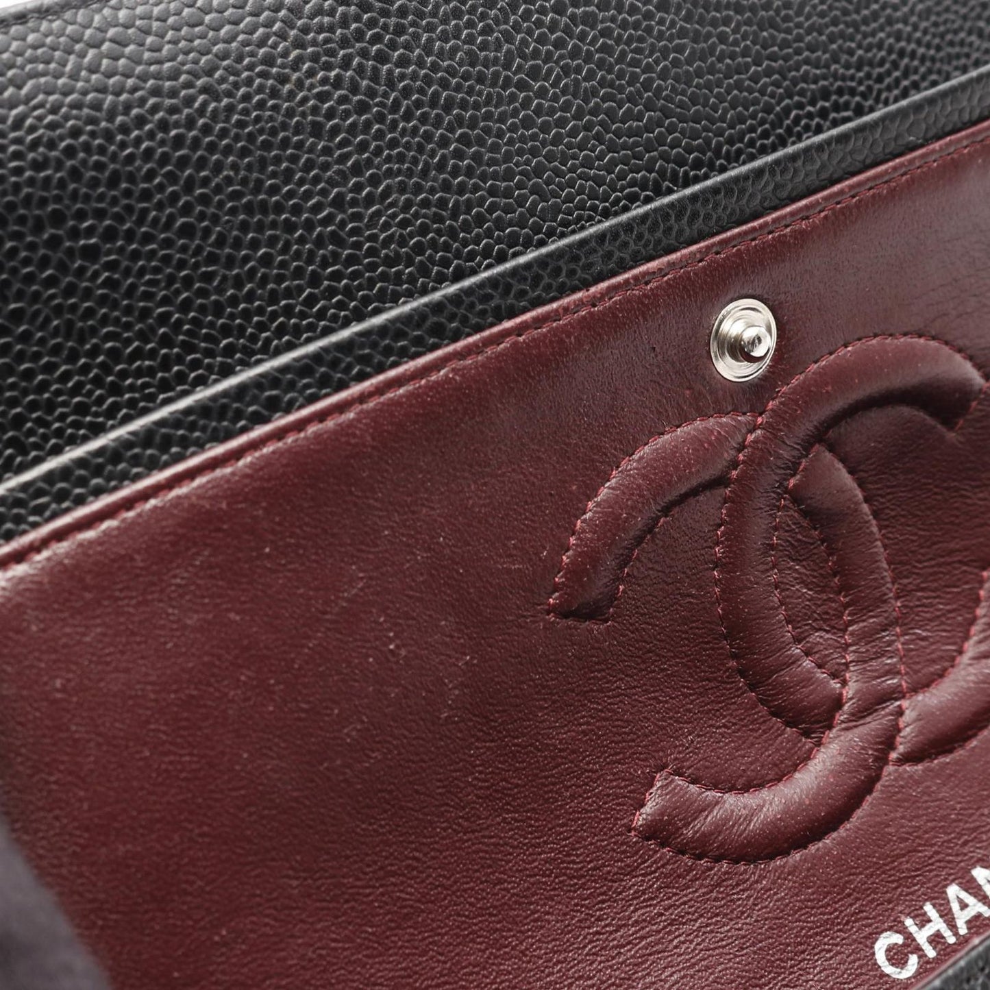 CHANEL Matelassé Double Flap Shoulder Bag in Black Caviar Skin