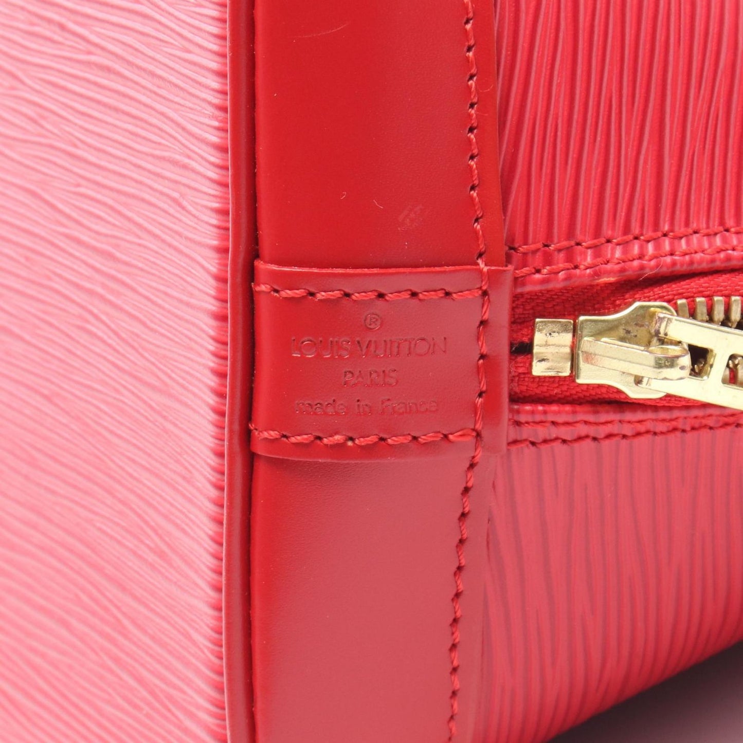 Louis Vuitton Alma Handbag in Castilian Red - Timeless Elegance