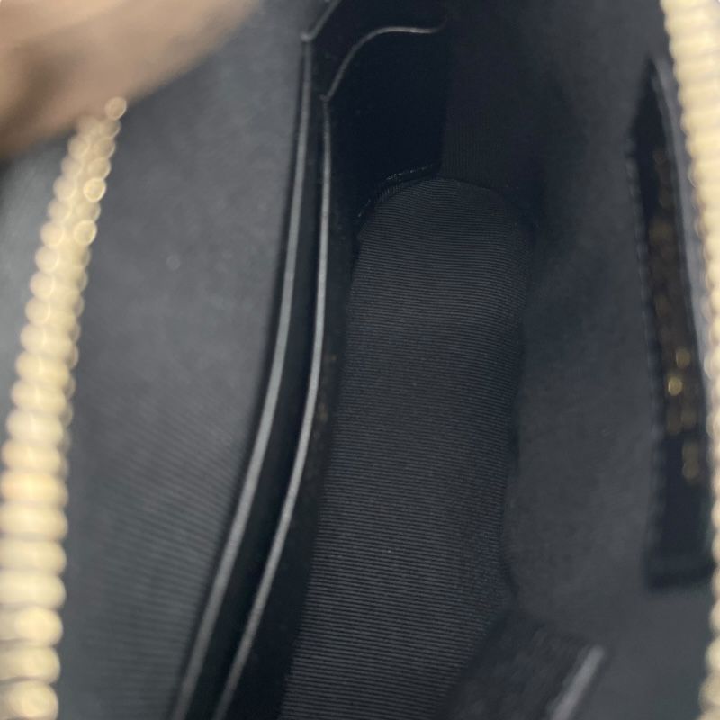 CHANEL Chain Shoulder Bag in Black/White Tweed - Timeless Elegance