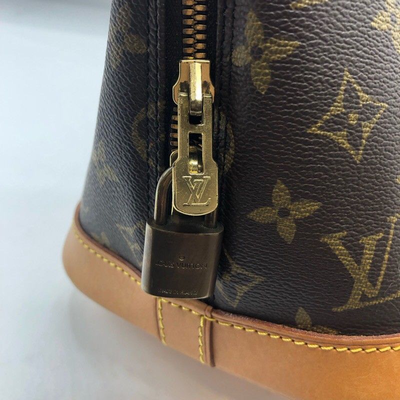 Louis Vuitton Alma M51130 Monogram Canvas Handbag - Timeless Elegance