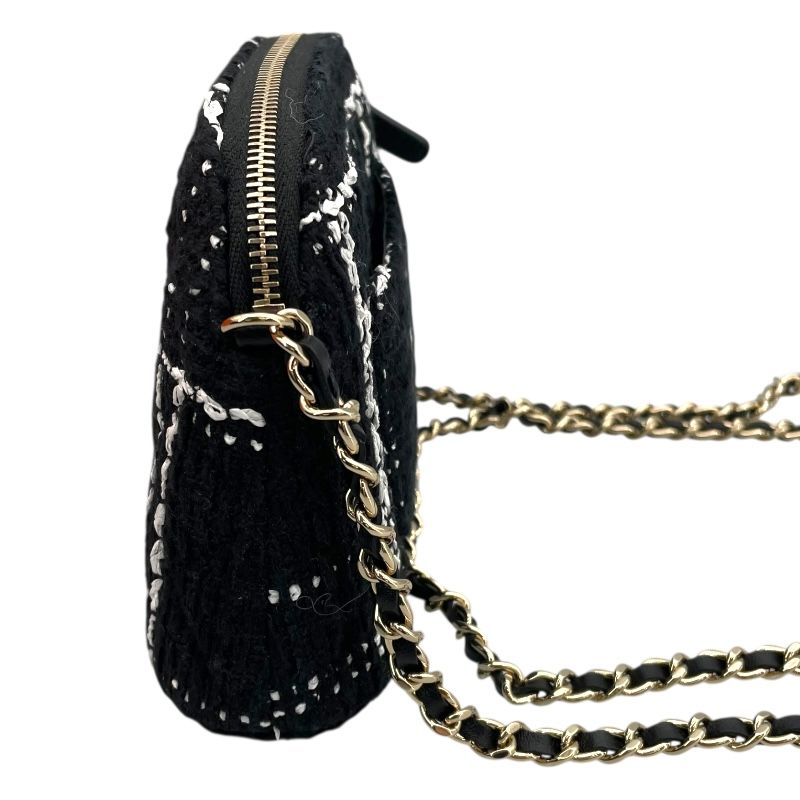 CHANEL Chain Shoulder Bag in Black/White Tweed - Timeless Elegance