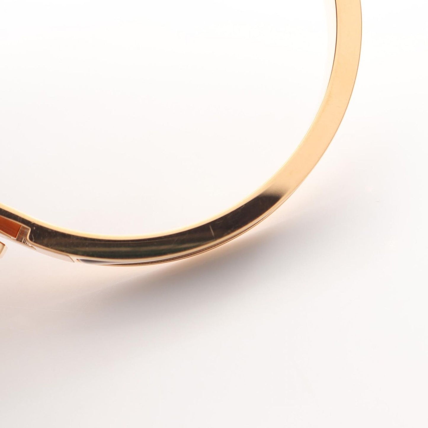 HERMES Mini Click Kelly Bracelet in Black & Gold - Unused Luxury