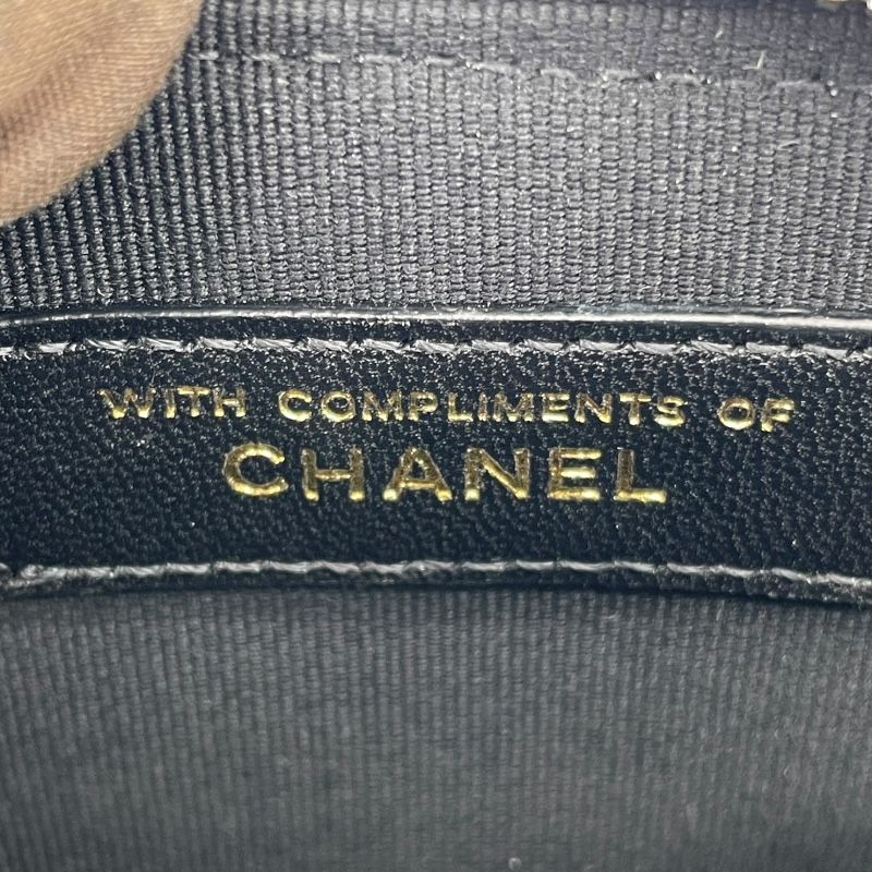 CHANEL Chain Shoulder Bag in Black/White Tweed - Timeless Elegance