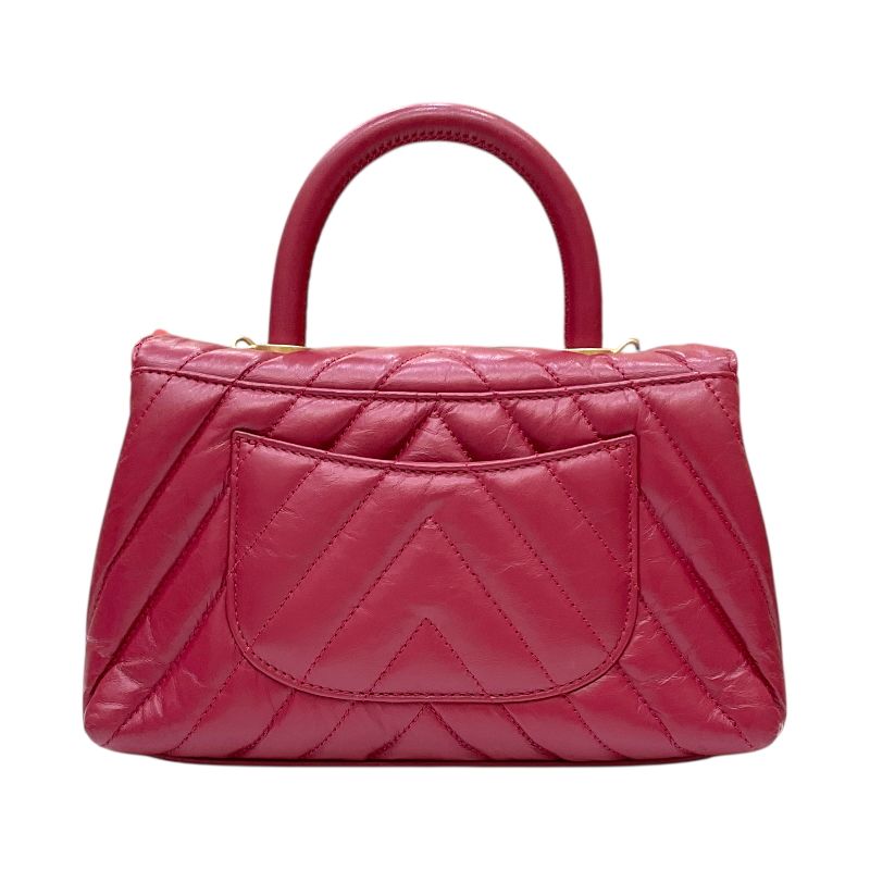 CHANEL Coco Handle XS V-Stitch Pink Lambskin Handbag