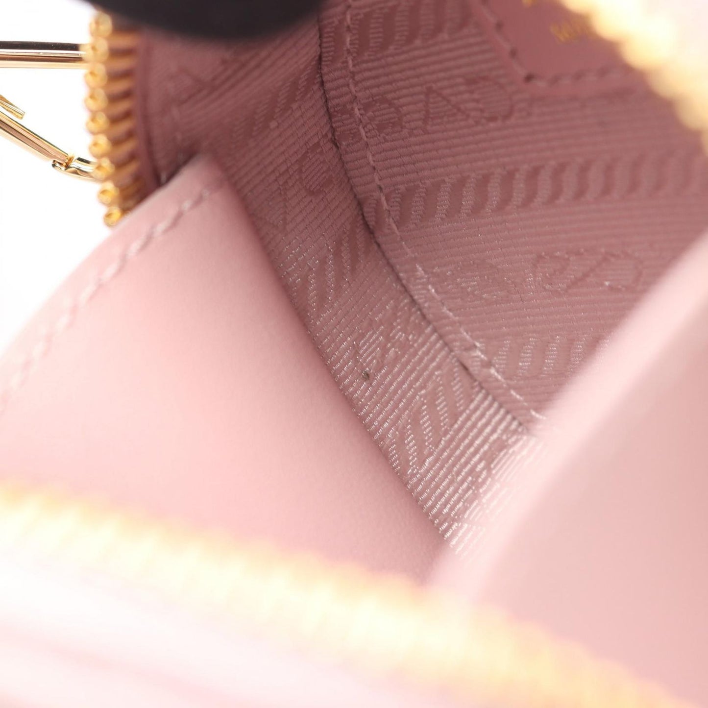 PRADA Saffiano Triangle Mini Pouch in Baby Pink - Unused Luxury