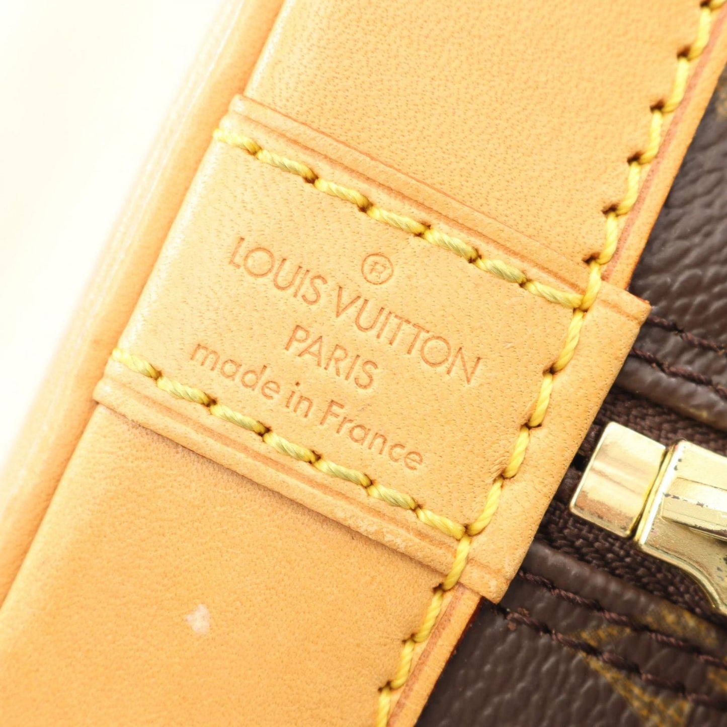 Louis Vuitton Alma PM Handbag - Timeless Elegance in Brown