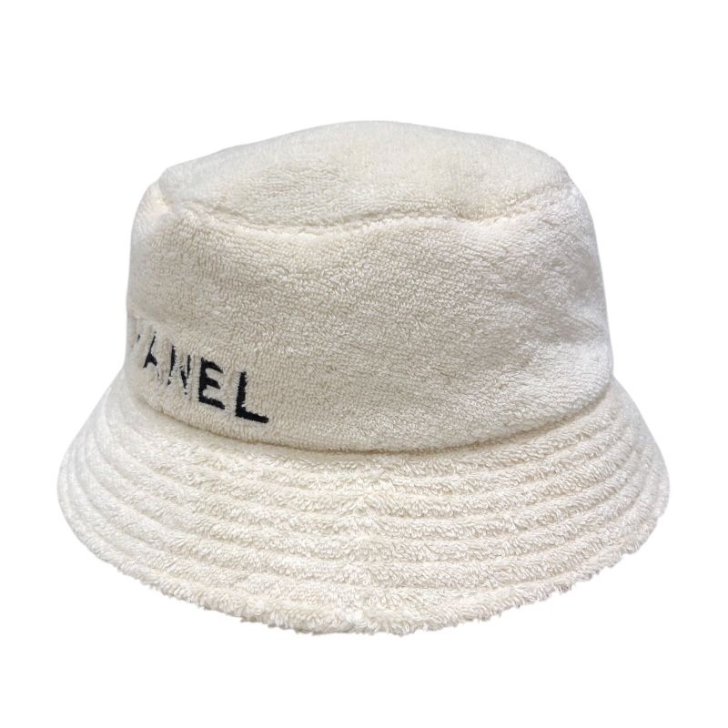 CHANEL Logo Embroidered Pile Bucket Hat in Cream Cotton