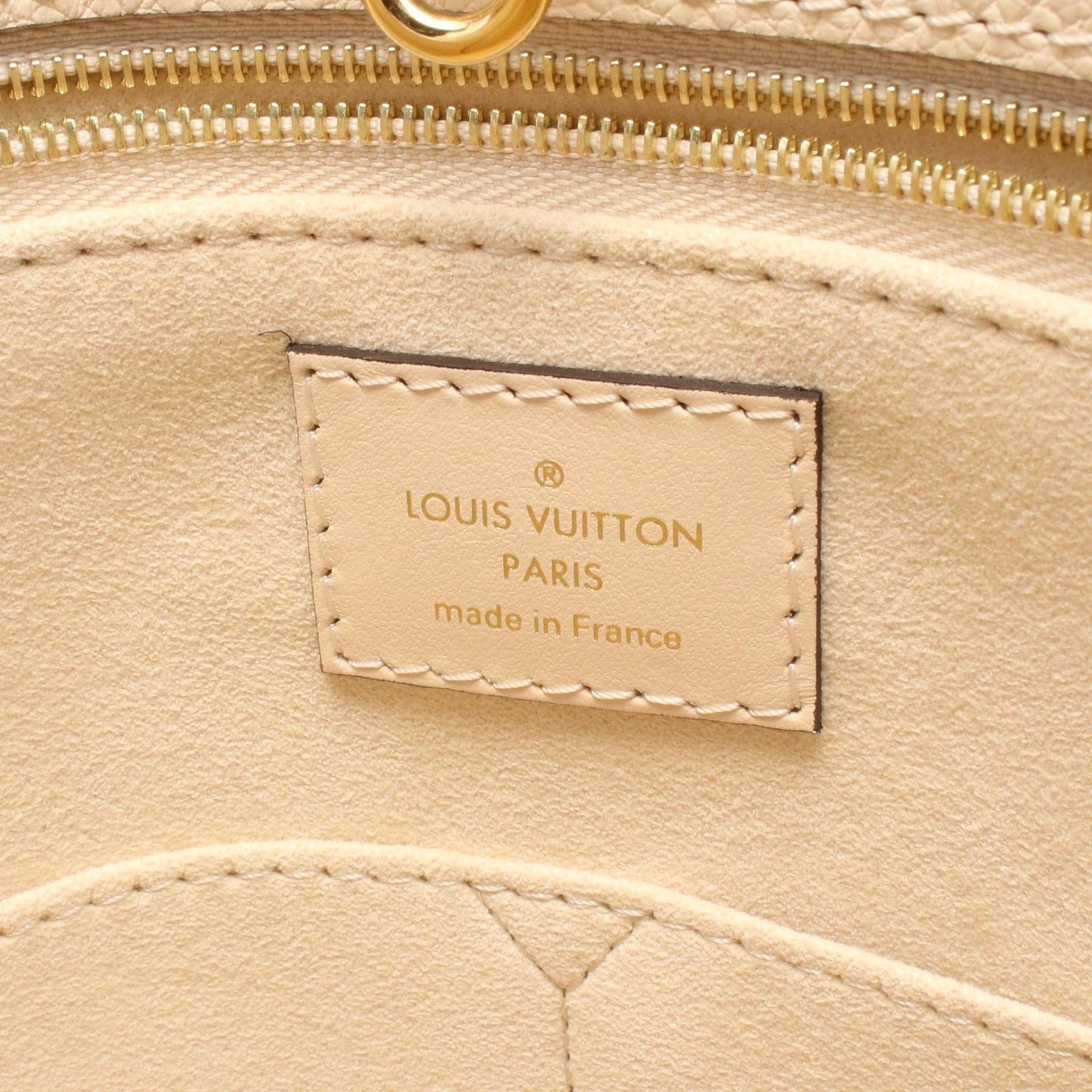 Louis Vuitton OnTheGo MM Tote Bag in Crème Leather - Exquisite Craftsmanship