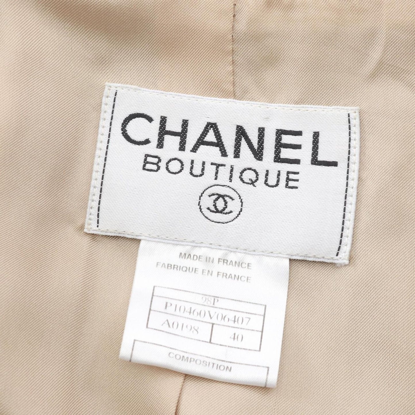 CHANEL Tweed Suit with Coco Mark Buttons - Timeless Elegance