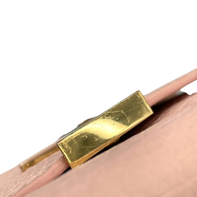 Louis Vuitton Capucines Compact Wallet in Rose Jasmine - Exquisite Craftsmanship