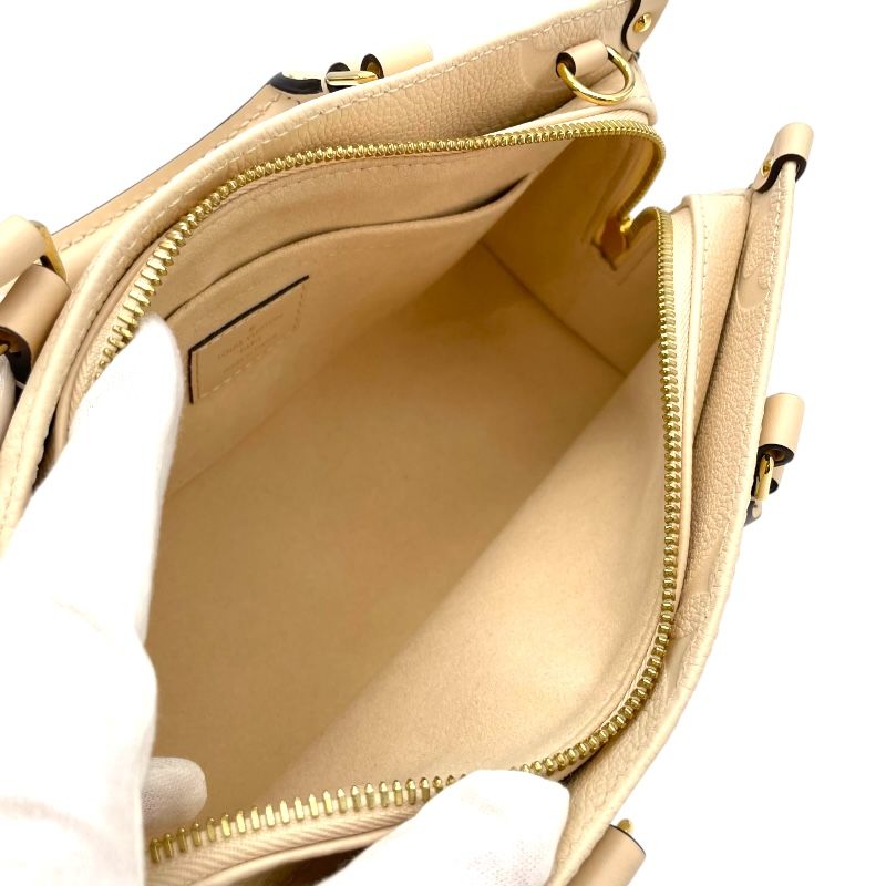 Louis Vuitton OnTheGo EW Monogram Empreinte Handbag - White