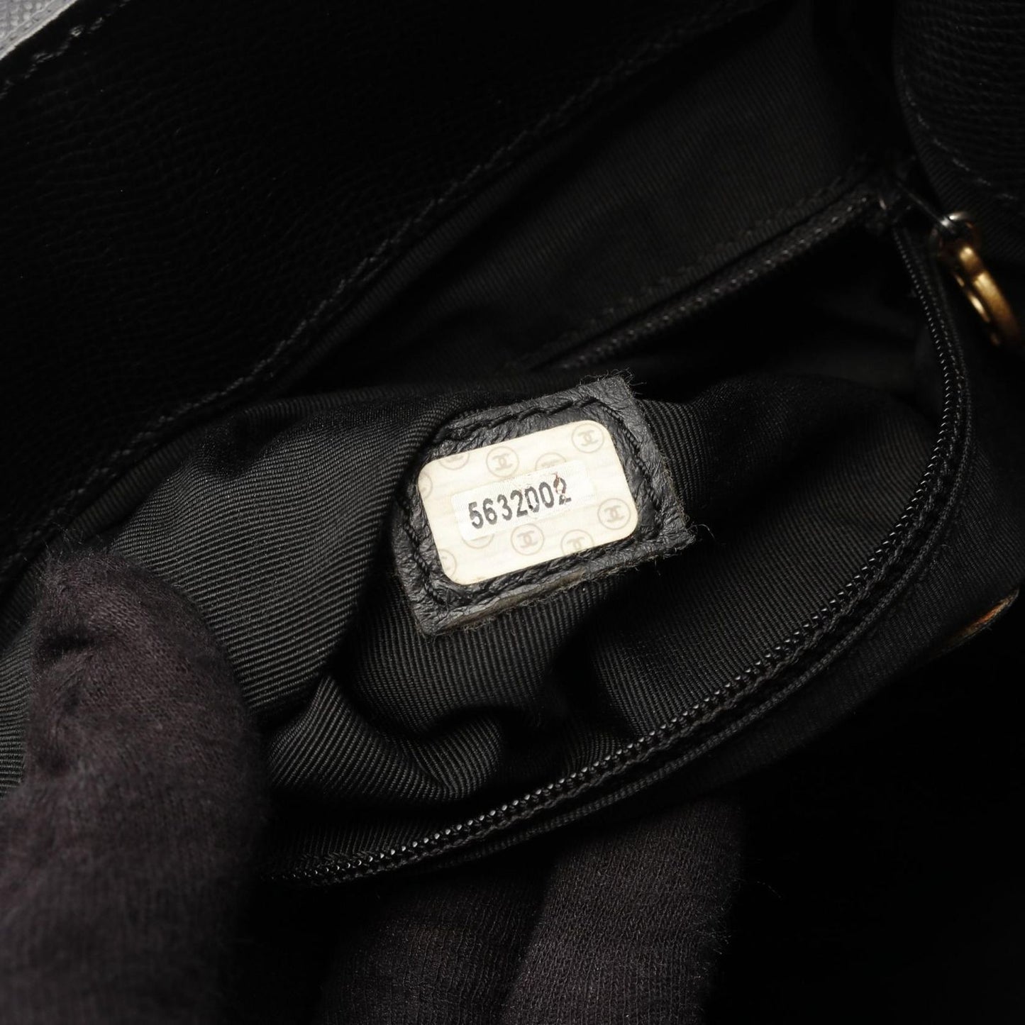 CHANEL Coco Mark Black Calfskin Backpack - Timeless Elegance