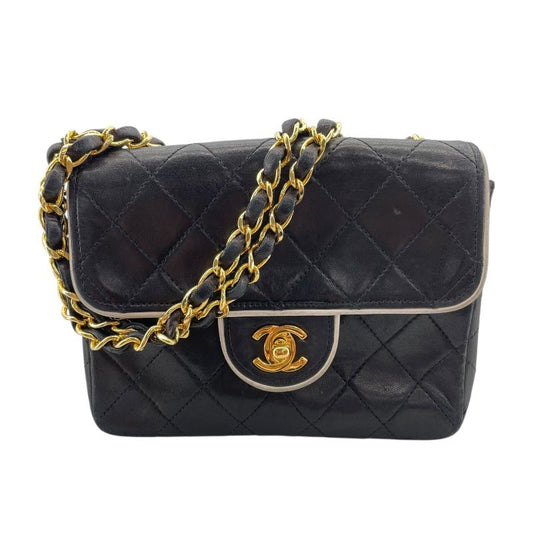 CHANEL Mini Matelassé 18 Black Leather Shoulder Bag - A01115